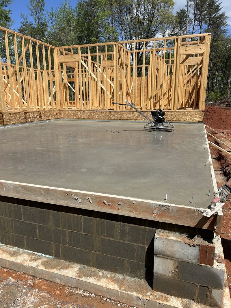 Concrete foundation slab finished with power trowel in Spartanburg SC