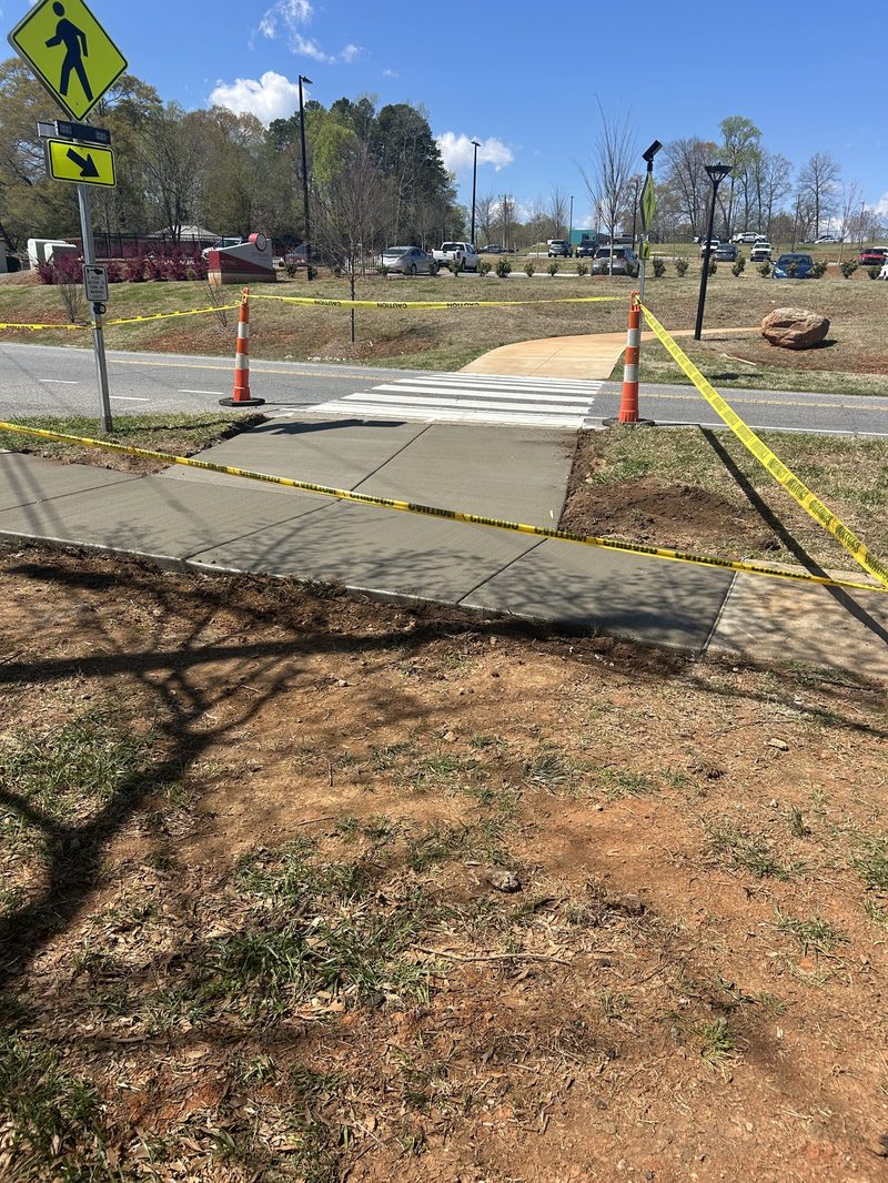 New concrete sidewalk and pedestrian crosswalk installation in Spartanburg SC