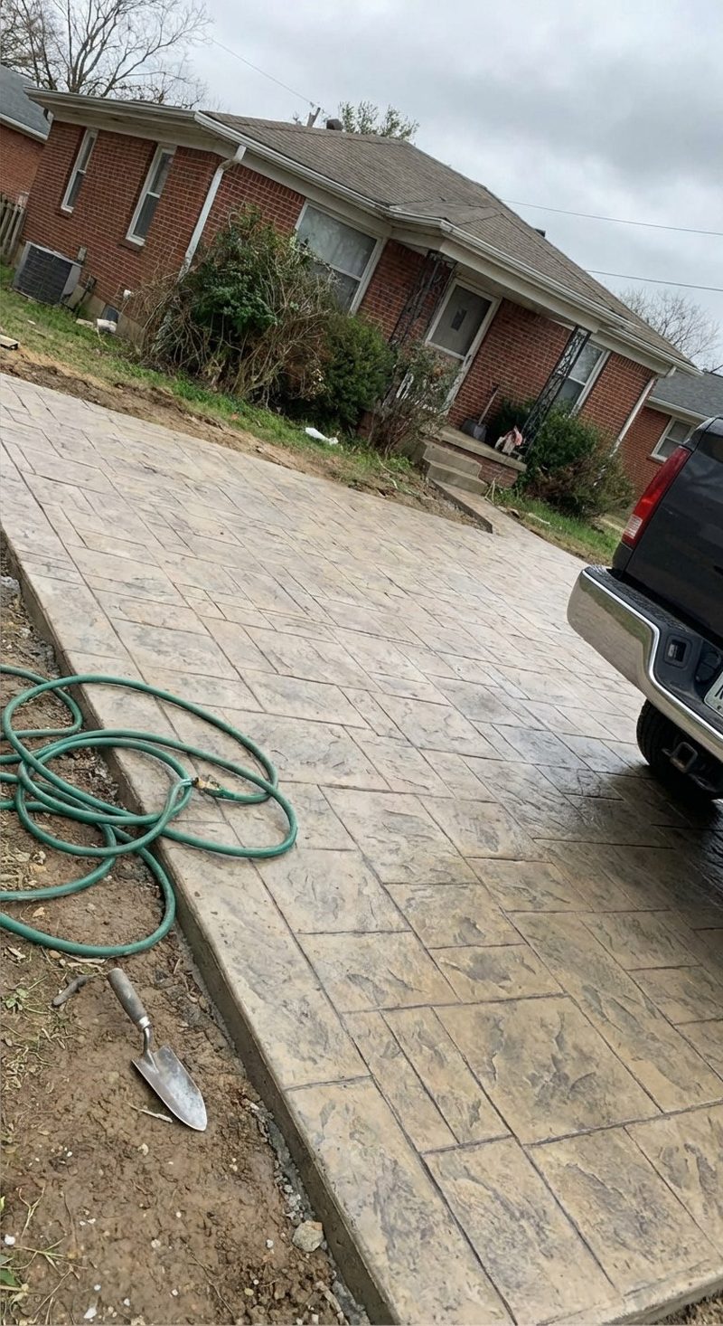 Stamped concrete driveway with ashlar slate pattern at residential home in Gaffney SC